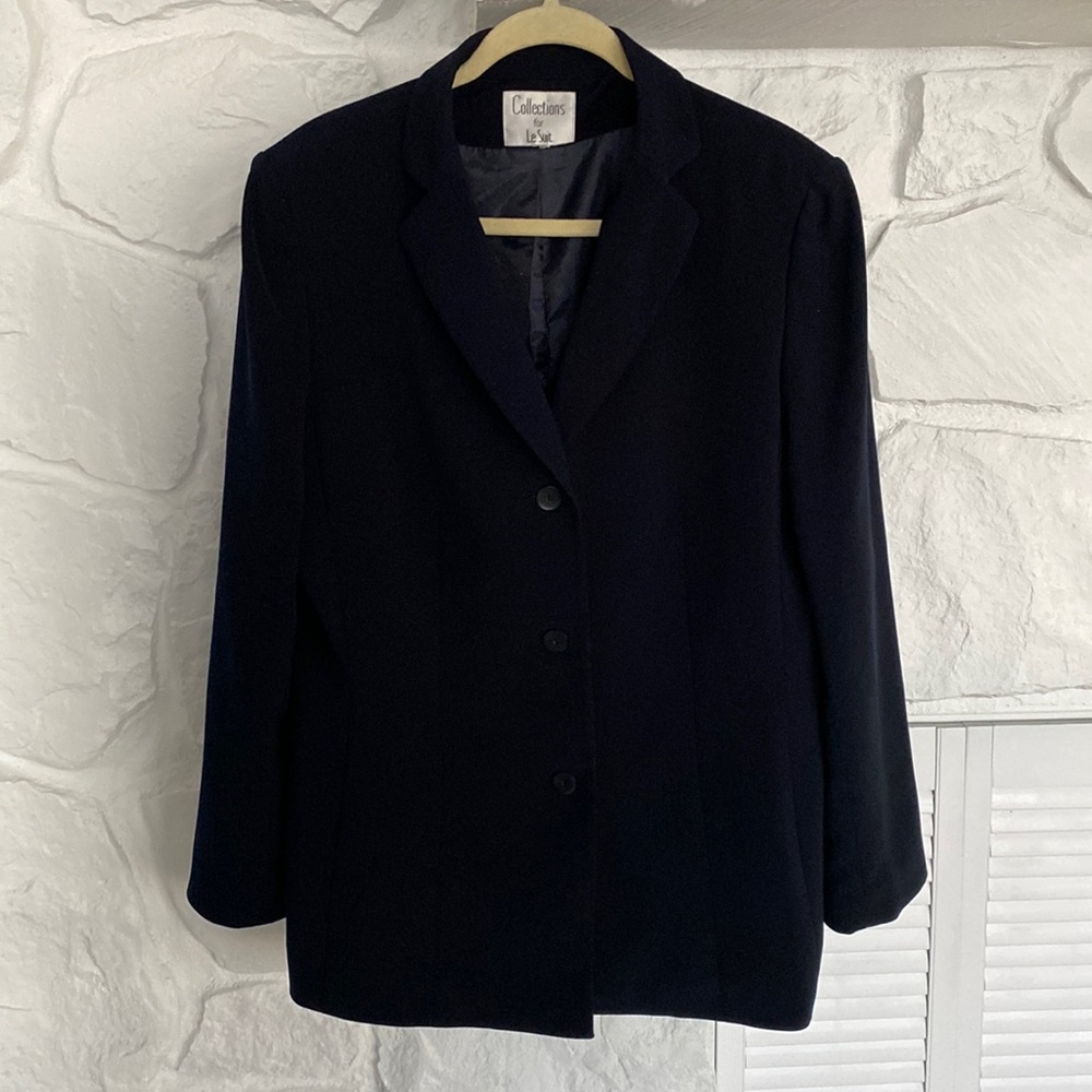 Dark navy three button suit coat lined